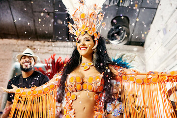 Samba, music and dance with woman at carnival for celebration, party and festival in Rio de Janeiro. Confetti, show and creative with brazil girl for performance, new year and culture event