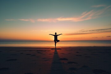 A yoga enthusiast embraces the stillness of the morning, finding balance and tranquility on a serene beach while striking a beautiful pose