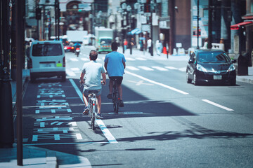 Fototapeta premium 自転車に乗る人