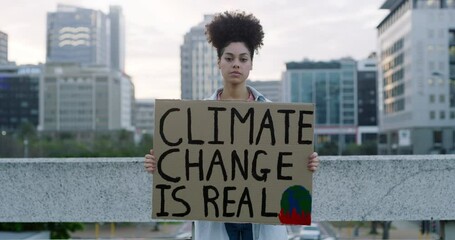 Woman, climate change protest and portrait with poster, global warming crisis and eco justice. Girl, protesting and banner to save, protect and fight for planet earth or environment politics
