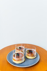 Top view of round Caramel custard cake on a wooden table, Custard chiffon cake, sweet and moist dessert. Sliced a piece of cake. Top view, Dessert, Obesity, bite of cake.