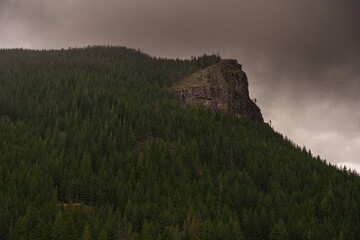 2021-04-26 RATTLESNAKE RIDGE WITH A HILLSIDE COVERED WITH PINE TREES AT RATTLESNAKE LAKE IN NORTH BEND WASHINGTON