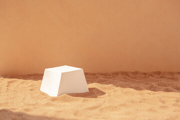Podium on sand background. shadow on the background for cosmetic perfume fashion natural product