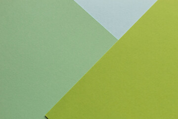 The paper green colors is lying on the table