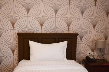 The background is the picture above the bed head.