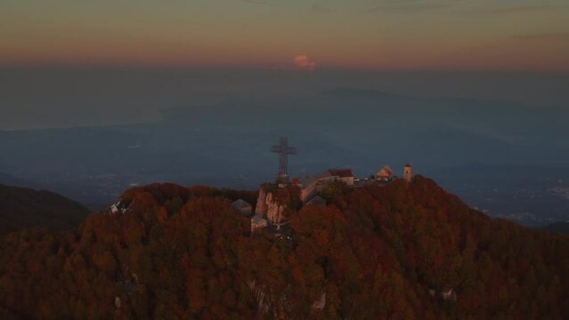 Sunrise vivid colorful aerial of a Sanctuary on the summit of a mountain Italy Sanctuary of Our Lady 'del Monte Sacro'