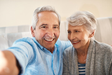 Senior couple, happy selfie and couch in retirement home for social media, blog post and internet....