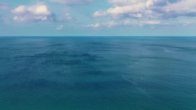 Beautiful sea surface summer landscape, Waves sea water surface High quality video Bird's eye view,Wide angle lens, Drone view ocean sea background