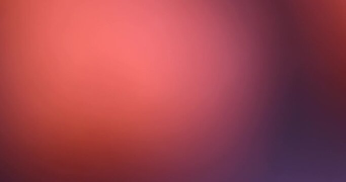 slow-moving abstract background in red, unfocused videography of a red object