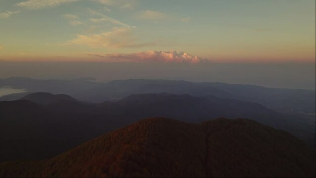 Sunrise vivid colorful aerial of dreamy mountains in the Cilento National Park Italy 4K drone