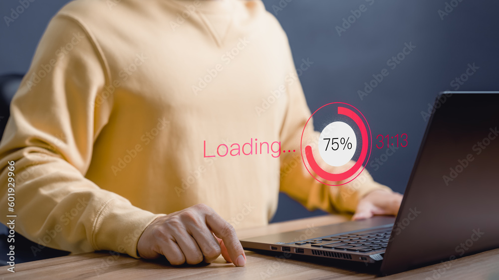 Fototapete Adult man using a laptop computer for download software and waiting to loading digital technology data form website, very slow internet form wifi. Concept of waiting for load of loading symbol.