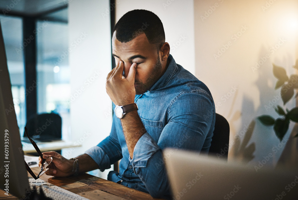 Wall mural Burnout, headache and man in the office while working on a deadline project with eye strain at night. Stress, migraine and professional male employee doing research on computer in workplace overtime.