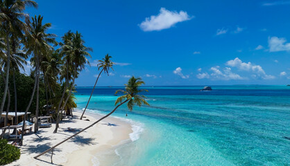 The summer tropical on the sandy beach and turquoise Tropical beach with blue sky background