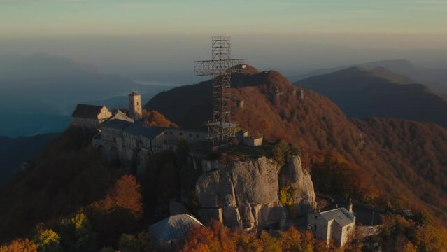 Sunrise vivid colorful aerial of a Sanctuary on the summit of a mountain Italy Sanctuary of Our Lady 'del Monte Sacro'
