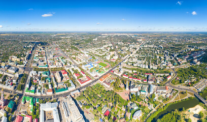 Fototapeta na wymiar Tambov, Russia. Panorama of the city from the air in summer. Clear weather with clouds. Aerial view