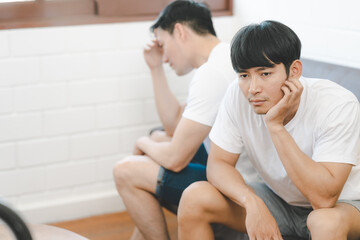 Asian Gay Couple Relationship Conflict And Divorce. Unhappy And Sad. gay couple going through relationship problems.