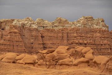 Scenic view on unique eroded sandstone hoodoo rock formations at Goblin Valley State Park, Utah,...