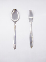 spoon and fork on a white background