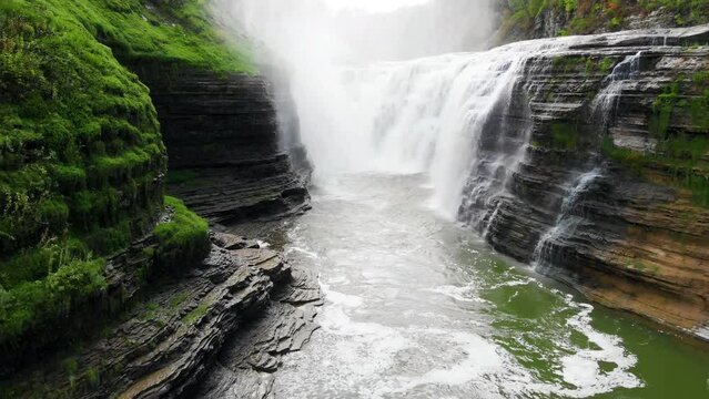 Aerial Pull Back at Upper Falls in Letchworth State Park. Wide shot aerial drone shot pull back of the upper falls at Letchworth State Park