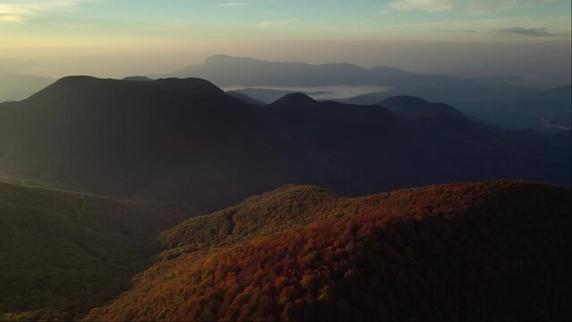 Sunrise vivid colorful aerial of dreamy mountains in the Cilento National Park Italy 4K drone