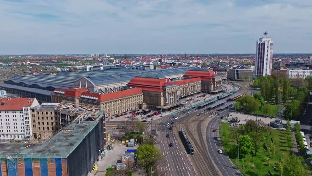 Drone shot of central railway terminus ( Hauptbahnhof ) in Leipzig , Germany, in the district Mitte .  it is Europe's largest railway station measured by floor area.
