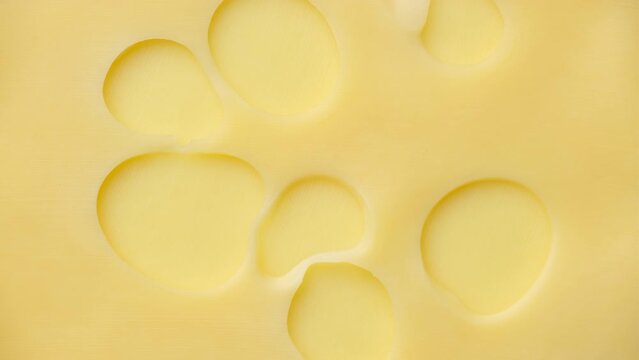 Slice of cheese with holes, rotation