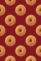 Cinnamon Doughnuts Pattern on Currant Red Background	