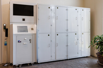 white smart locker for travelers. electronic steel parcel locker, automatic mailboxes.