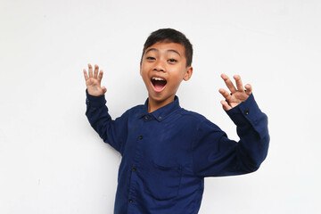 Surprised boy wearing a blue casual shirt Isolated on white background