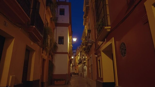 Empty Narrow Alley Street in Old Town of Sevilla at Night Seville, Spain