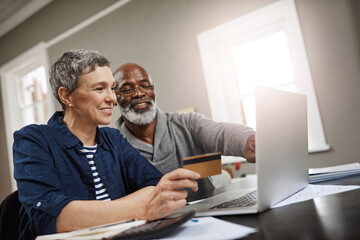 Credit card, laptop and senior couple for online shopping, ecommerce and fintech payment for home insurance. Finance, pension or financial investment of biracial woman and partner on computer banking - Powered by Adobe