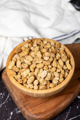Dried mulberry. Sun-dried organic white dried mulberry in wooden bowl. Superfood, Vegetarian food concept. healthy snacks. Close up