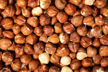 Hazelnut. Peeled hazelnuts closeup food background. Texture. Top view. Copy space banner