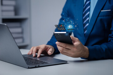 Businessman is holding smartphone with hologram, manipulating smartphone control, manipulating smartphone to suit user's usage.