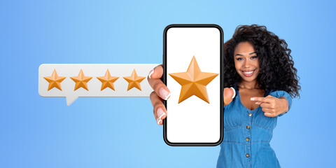 African woman showing smartphone with five star rating