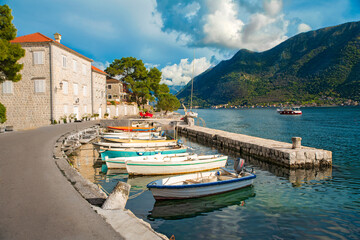 Historical city of Perast in Montenegro. Bay of Kotor view of the city and mountains.
