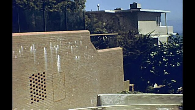 San Francisco, California, United States - circa August, 1979: seventies footage of vintage car down to the incredible Lombard Street. first person view.
