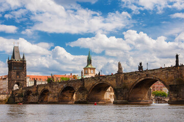 Medieval Charles Bridge on River Vltava with Old Town Bridge Tower and Water Tower in Prague