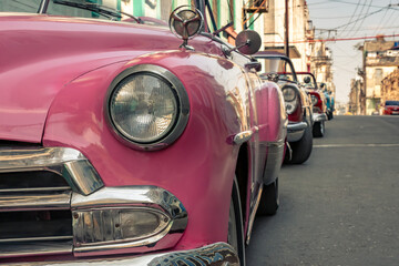 Old American car in the historic streets of Havana in Cuba