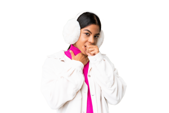 Young African American woman wearing winter muffs over isolated chroma key background is suffering with cough and feeling bad