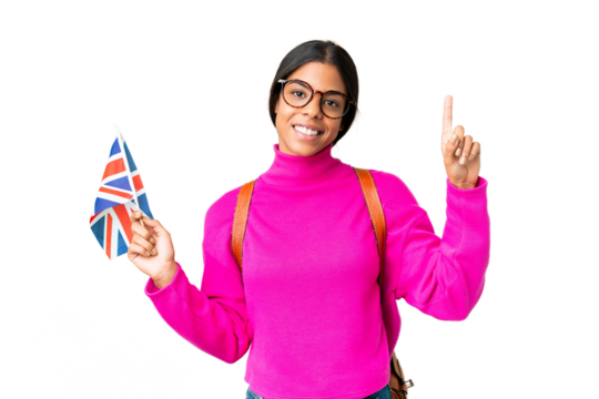 Young African American woman holding an United Kingdom flag over isolated chroma key background pointing up a great idea