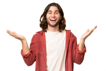 Young handsome man over isolated background with shocked facial expression