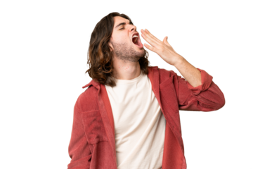 Young handsome man over isolated background yawning and covering wide open mouth with hand