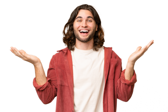 Young handsome man over isolated background with shocked facial expression