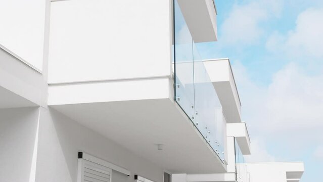 Modern home balcony with glass railing