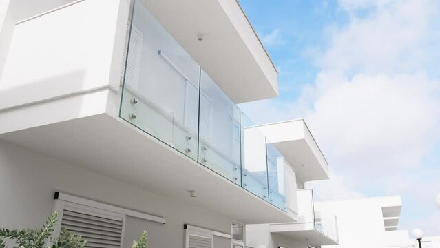 Modern home balcony with glass railing