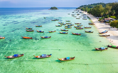 A lot of wooden boats at the beach of Koh Lipe, Satun Province, Thailand.