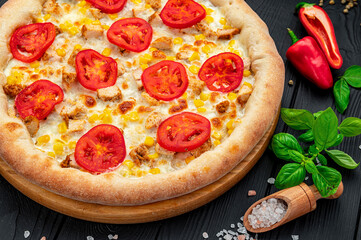 Tasty and big pizza with different types of meat