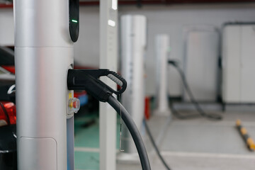 electric car charging in station 