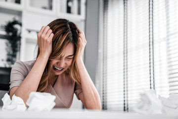 A competent female employee who has become completely exhausted as a result of overburdened work. Concept of unhealthy life as an office worker, office syndrome. - obrazy, fototapety, plakaty